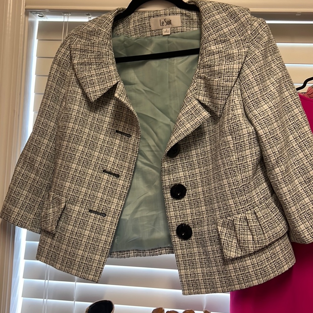Perfect condition. Cropped length. Meant for high waisted skirt or over a dress